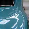 Repaired car body panel after collision service